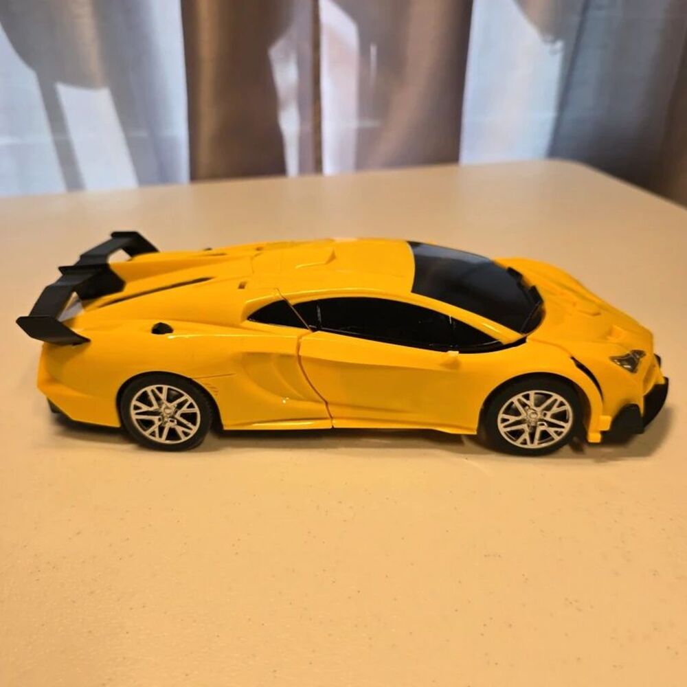Yellow transformer RC car. Mirror broken no remote